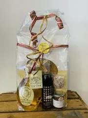 Cadeaupakket met pasta, witte balsamico, confettura en amandelbiscuits, met tricolore lint
